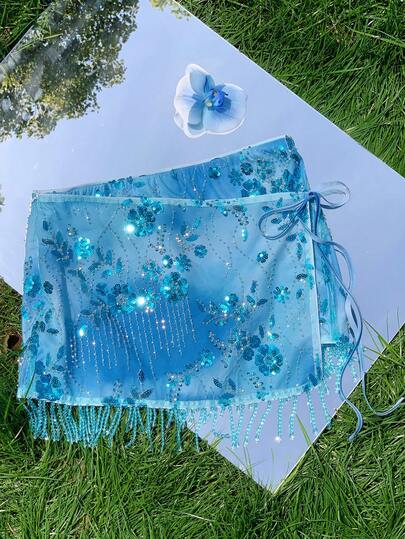 Comfortcana Chân váy ngắn nữ thời trang thanh lịch, thêu họa tiết đính sequin và tua rua ở gấu váy.