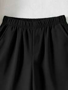 SHEIN Vacaura Set de 3 piezas para niños preadolescentes: Camisa blanca con estampado floral en contraste, pantalones blancos holgados con estampado en contraste y decoración con cinta - Negro - Ver 5