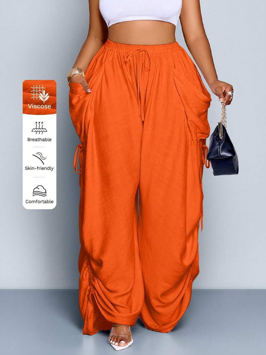 SOLERSUN Pantalones anchos de pierna ancha con cintura de amarre y bolsillos grandes para mujeres de talla grande - Naranja - Ver 1