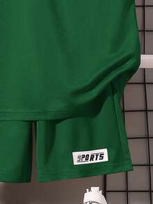 SHEIN Bộ đồ 2 món cho bé trai tuổi teen: áo hoodie và quần short in chữ. - Màu xanh lá cây đậm - Xem 5