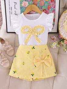 Elladie kids Bộ đồ thường ngày 2 món cho bé gái: Áo cổ tròn ôm dáng mềm mại, dáng suông, phối vàng và trắng kẻ caro, tay bồng, nơ, gồm áo vàng chanh và quần kẻ caro có nơ. - Màu vàng - Xem 7