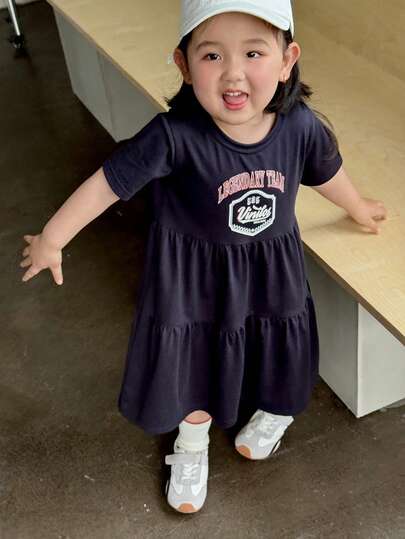 DAZY Toddler Girls' Round Neck Casual Short Sleeve Ruffle Trim English Print Short Sleeve Dress