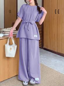 SHEIN Bộ đồ 2 mảnh dành cho nữ tuổi teen, gồm áo sơ mi dệt họa tiết, dáng rộng, vai rớt, thắt eo, in chữ và quần ống rộng, thích hợp cho mùa xuân/hè, dã ngoại mùa xuân, đi chơi thường ngày, dạo phố, đi nghỉ mát, đi học, các ngày lễ, dã ngoại gia đình mùa xuân, và mặc hàng ngày. - Màu tím - Xem 3