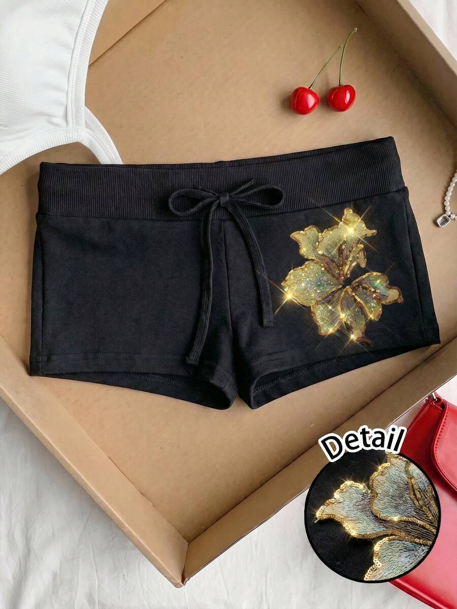 SHEIN Comfortcana 休闲针织刺绣花卉印花女式罗纹腰短裤，适合日常通勤、约会、聚会、秋冬夏、圣诞节、新年、感恩节、派对、婚礼、海滩、毕业典礼、时尚、优雅、休闲、外出、约会、预订、通勤、闪亮、情人节、优雅、度假、休闲、Y2K、外出、毕业典礼等场合。 - 黑色 - 查看 1