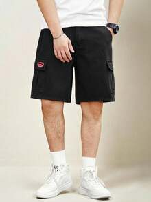 Manfinity Homme Shorts de mezclilla holgados para hombres con parches de letras y bolsillos con solapa, jorts holgados negros lisos para salir de moda rapero - Negro - Ver 1