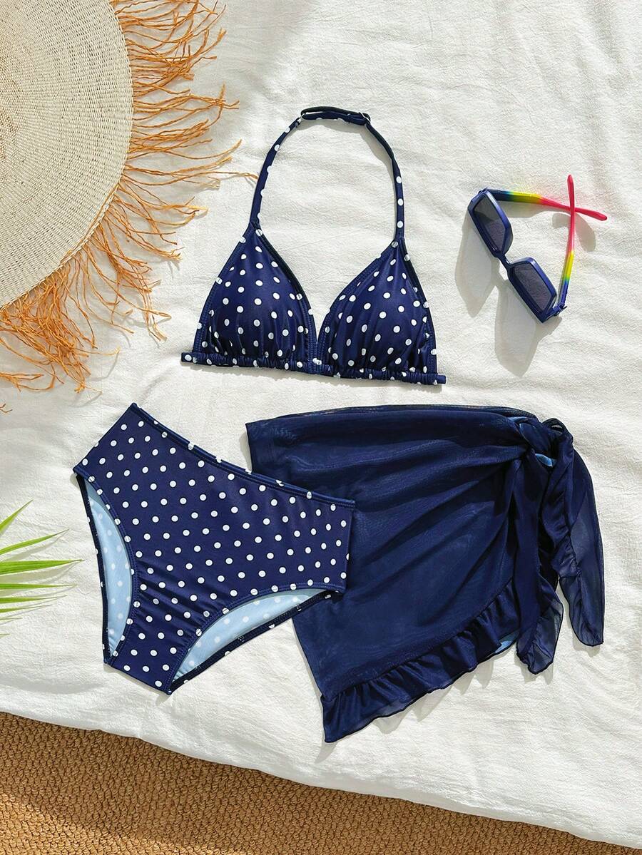 SHEIN Bộ bikini chấm bi xanh navy và trắng dành cho bé gái tuổi teen: Áo tam giác buộc dây cổ, quần tam giác, váy lưới màu xanh navy. Phong cách nghỉ dưỡng Pháp dễ thương, kín đáo và thoải mái, thích hợp cho bơi lội, hồ bơi, lướt sóng, kỳ nghỉ, lễ hội, nghỉ xuân, bãi biển. - Nhiều màu - Xem 1