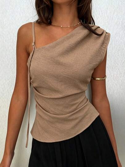 Siren Gaze Women's Solid Color Ruched Off-Shoulder Fashionable Versatile Blouse For Dates And Outings Women's Asymmetric Shoulder Wrap Ruched Waist Tight Fit T-Shirt With Metal Decor, Elegant Modest Daily Commute Tops,Coachella Earth Day Gala Mother's Day Graduation Season Vacation Cruise Resort Travel Festival Season Wedding 4th Of July Back To School  Modern Gothic OOTD  Summer Top Asymmetric V-Neck Ruched Waist Blouse, Sexy Elegant Office Lady Top With Metal Button Decor On Shoulder, Fashion, Commute, Elegant, Sexy, Holiday, Beach, Hawaii, Outerwear Summer Casual Elegant BrownTop With An Asymmetrical Shoulder Neckline Asymmetrical Hem T-Shirt Features A Slimming And Flattering Silhouette, Making It A Stylish And Versatile Choice For Both Work And Casual Wear. Summer Asymmetrical Ruffle Blouse, Metal Button Decor Asymmetrical Shoulder Blouse, Spring Break, Going Out Tops, Elegant Blouses For Women, Metal Buckle Glitter Top, Brown Top, Casual Blouses For Women Coffee Brown Top Brown Blouses