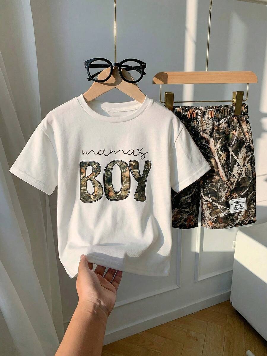 SHEIN 2pcs Young Boys White Summer Set,Casual Cute Graffiti Cartoon Pattern Round Neck Short Sleeve T-Shirt And Shorts Knit Set,Toddler Kids Outfits,School - Multicolor - View 1
