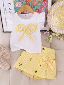 Elladie kids Bộ đồ thường ngày 2 món cho bé gái: Áo cổ tròn ôm dáng mềm mại, dáng suông, phối vàng và trắng kẻ caro, tay bồng, nơ, gồm áo vàng chanh và quần kẻ caro có nơ. - Màu vàng - Xem 4