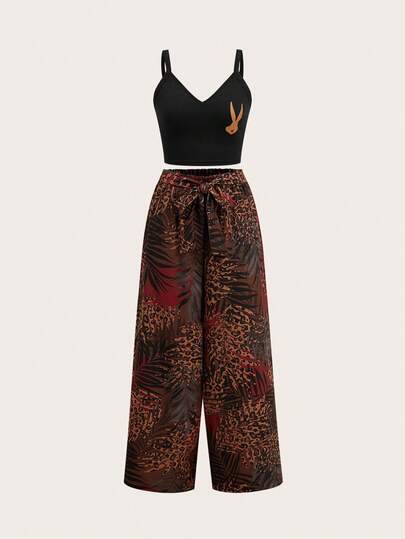 Slaydiva LOONEY TUNES X SHEIN Bộ đồ 2 mảnh phong cách nghỉ dưỡng thường ngày, họa tiết lá cọ và chấm bi hoạt hình màu đen & nâu, quần ống rộng phối cùng áo tank top đen, thích hợp cho nữ mùa xuân và hè.