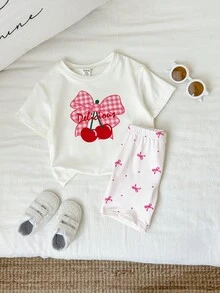 SHEIN Set de 2 piezas de pijama para niña bebé con shorts estampados a cuadros y camiseta de manga corta holgada de verano - Multicolor - Ver 7