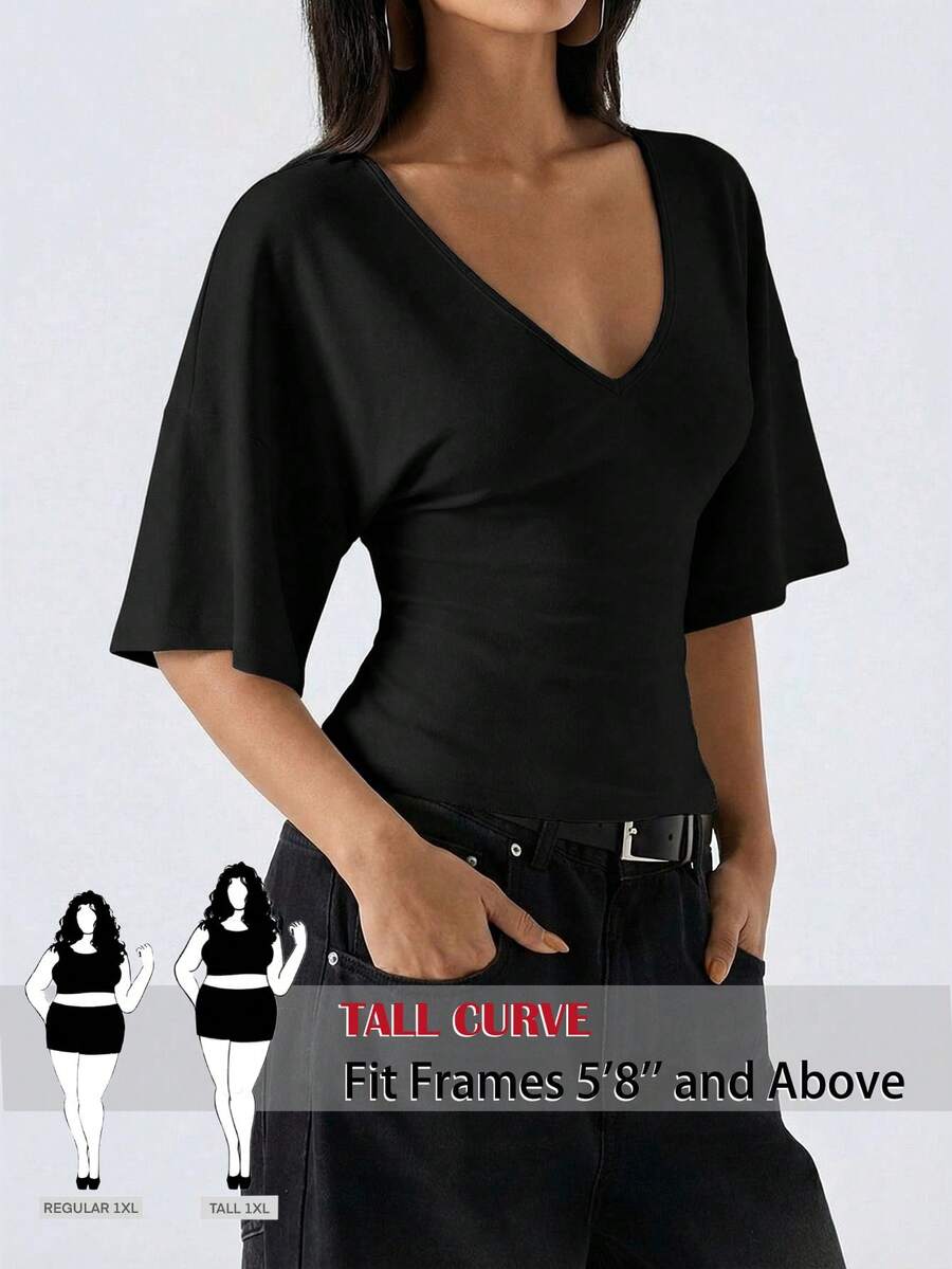 SHEIN Tall CURVE Blouse ample à manches évasées de couleur unie pour femmes grandes tailles, convenant pour le travail, les fêtes de Thanksgiving, les cérémonies de remise des diplômes et autres occasions. Élégante et à la mode, décontractée et confortable, avec un col en V profond. Top de mode noir pour dames, Top décontracté à manches, chemise moderne pour femmes - Noir - Voir 1
