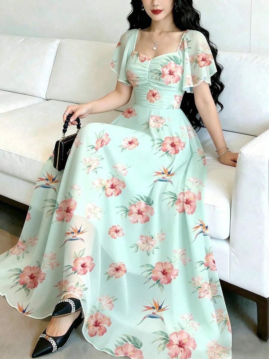 Modelyn Vestido floral verde claro com estampa de hibisco, decote quadrado e mangas curtas. Elegante e moderno, com cintura marcada, perfeito para férias de verão, uso diário e resorts de praia. Ideal para o verão, férias e praia. - Multicolorido - Ver 1