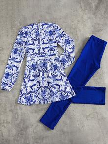 Swim Mulvari Ensemble bikini 2 pièces bleu et blanc pour femmes, Top à manches longues avec imprimé vintage en porcelaine bleu et blanc assorti à un pantalon de couleur unie, protection de la peau pour l'été, col montant avec fermeture éclair, style méditerranéen de luxe, élégant et sophistiqué pour adulte, ambiance décontractée de villégiature, plage et île - Bleu et Blanc - Voir 7