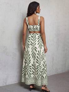 Bộ trang phục đi nghỉ mát gợi cảm dành cho nữ, áo croptop hai dây buộc phía trước và chân váy xẻ tà in hoa, thích hợp cho mùa xuân/hè. - Nhiều màu - Xem 2