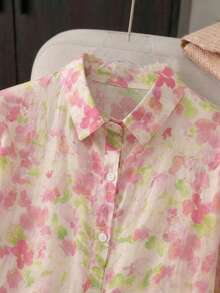 Divinelle Áo sơ mi nữ dáng xòe in họa tiết thực vật ngọt ngào, cổ nhọn, cài cúc phía trước, tay xếp tầng, kiểu dáng cơ bản giúp định hình vòng eo, thích hợp mặc đi làm hàng ngày vào mùa xuân hè. - Hồng - Xem 9