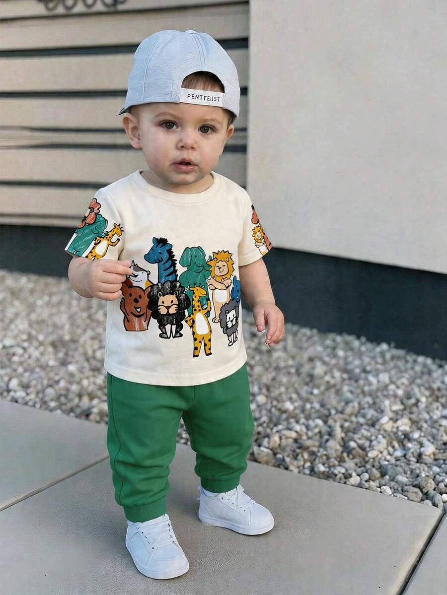 SHEIN 2pcs Baby Boys Beige Summer Casual Beach Set,Loose Short Sleeve T-Shirt&Pants,Cute Animal Zoo Pattern Print,Cartoon Lion,Tiger,Elephant,Zebra,Giraffe - Multicolor - View 1