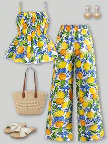 SHEIN Bộ đồ thời trang thường ngày cho bé gái lớn, áo hai dây vải dệt họa tiết chanh vàng in kỹ thuật số kết hợp với quần ống đứng họa tiết chanh vàng in kỹ thuật số, bộ 2 món, chất liệu mềm mại và thoải mái, kiểu dáng dễ thương và đơn giản, phù hợp cho bé gái tuổi teen mặc thường ngày, đi học, đi chơi, nghỉ lễ vào mùa xuân và mùa hè. - Nhiều màu - Xem 4