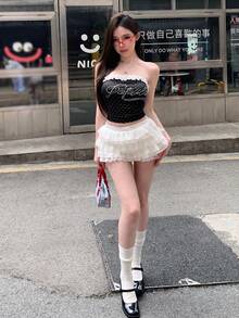 DAZY 亮面水鑽字母印花黑白波點夏季 Y2K 風格女款短版背心，無袖細肩帶修身收腰，適合夜店、音樂祭、海灘 - 黑色 - 查看 8