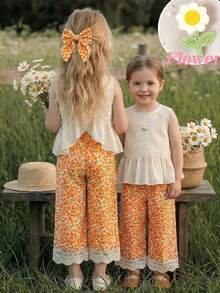Emery Rose Kids Emery Rose Kids مجموعة ملابس علوية أكمام بلا أكمام ذو رقبة دائرية وبنطال طويل لون أحادي للفتيات الصغيرات، 2 قطعة - لون برتقالي - مشاهدة 2