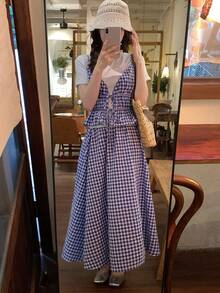 Bộ đồ hai mảnh gồm áo hai dây kẻ caro và chân váy chữ A dành cho nữ, phong cách Hàn Quốc tươi trẻ cho kỳ nghỉ. - Màu xanh lam - Xem 8