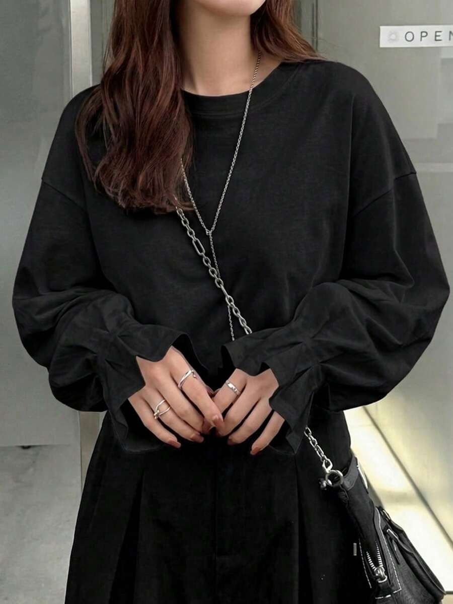 FRIFUL تي شيرت نسائي بلون موحد برقبة دائرية وأكمام طويلة منسدلة فضفاضة كاجوال للصيف - الأسود - مشاهدة 1