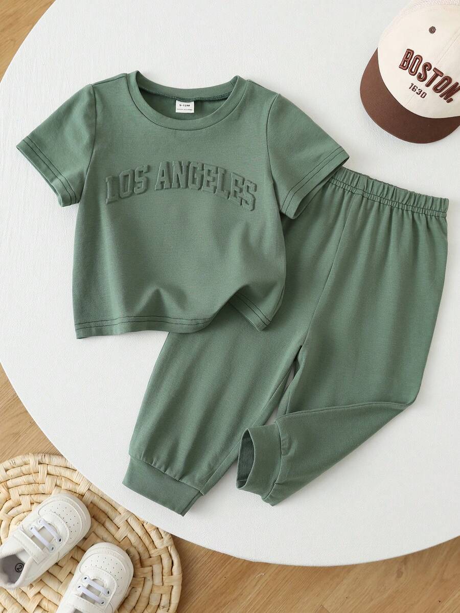 SHEIN Bộ đồ đôi unisex cho bé trai/bé gái, 100% cotton, họa tiết dập nổi 3D, thích hợp mặc mùa xuân/hè, gồm áo thun ngắn tay và quần, bộ quần áo mùa hè cho bé trai. - Màu xanh lá cây đậm - Xem 1