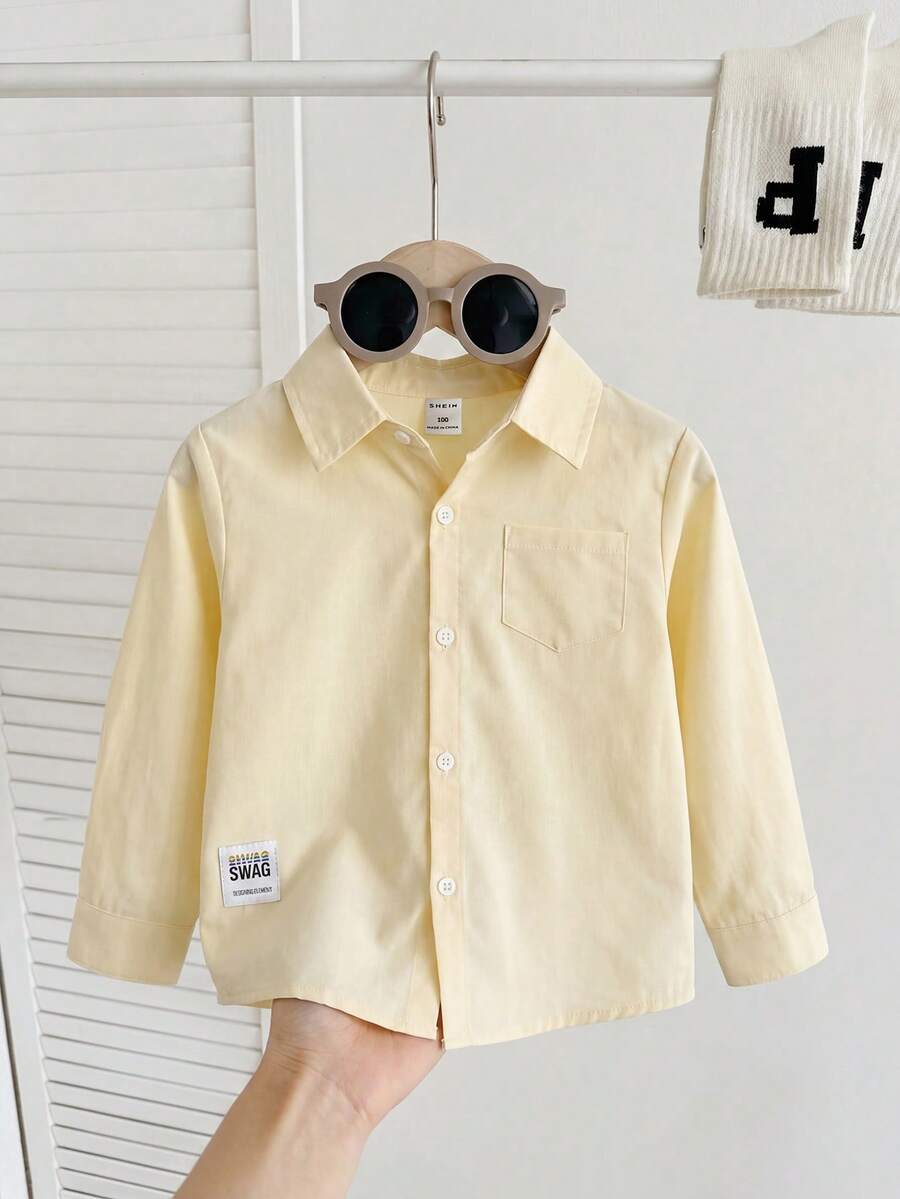 SHEIN 男童休闲舒适纯色长袖衬衫,精致小巧的品牌标识,搭配休闲裤穿着舒适,适合日常休闲、旅行、聚会、度假和上学等场合,春秋季百搭,秋冬季时尚有型。 - 黃色 - 查看 1