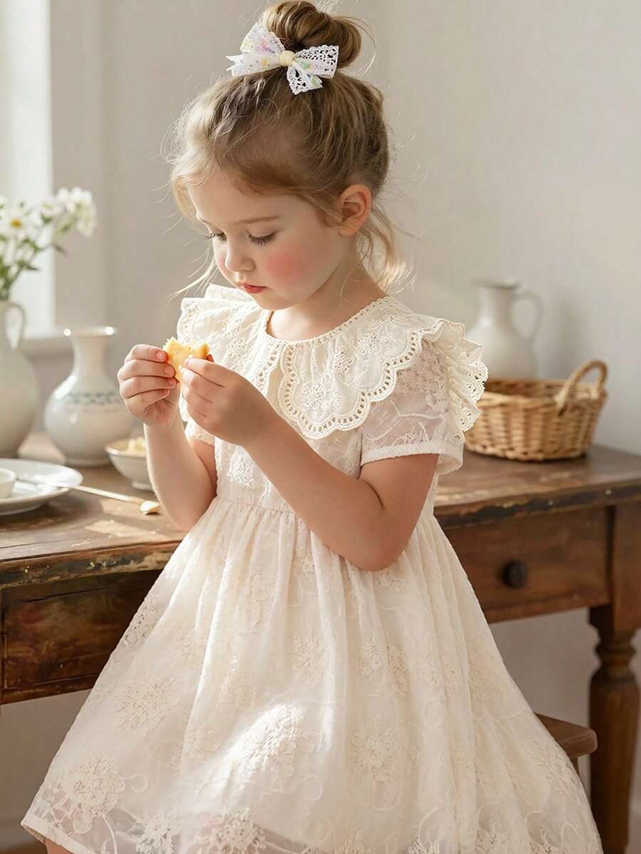 Souflis Souflis Đầm công chúa mùa hè thêu họa tiết cho bé gái, cổ bèo nhún, tay ngắn, dáng chữ A, thích hợp mặc đi học hàng ngày, đầm dài kiểu công chúa ngọt ngào phù hợp cho các bữa tiệc, tiệc chiêu đãi, sinh nhật, thiết kế tổng thể thanh lịch và duyên dáng. - trắng - Xem 1