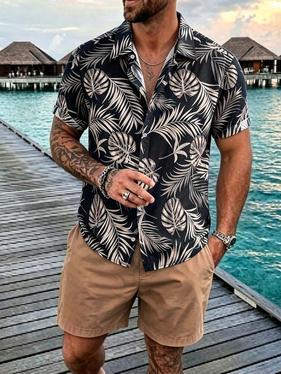 Manfinity RSRT Conjunto de camisa de manga corta con estampado de plantas tropicales de solapa única y pantalones cortos con cordón en la cintura para hombres de talla grande - Negro - Ver 1