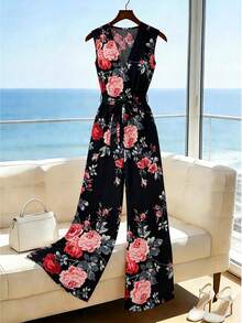 SHEIN Franclia Bộ áo liền quần mùa hè in hoa cho nữ, thiết kế ống rộng, thắt eo, thanh lịch và thời trang; Áo liền quần in họa tiết lá; Áo liền quần ống rộng thanh lịch cho nữ; Áo liền quần in hoa thanh lịch cho nữ; Áo liền quần in hoa không dây vai - màu đen - Xem 5