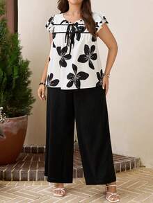 Comfylo Conjunto de 2 piezas de blusa con estampado floral y pantalón de unicolor talla grande - Blanco y Negro - Ver 4