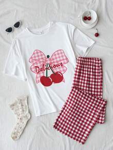 Bộ đồ ngủ thường ngày dành cho bé gái tuổi teen, gồm áo thun in họa tiết và quần kẻ caro. - Đỏ và trắng - Xem 6