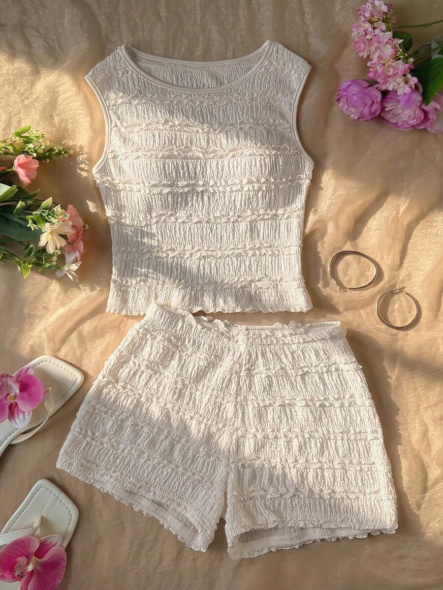 SHEIN Bộ đồ cơ bản 2 mảnh cho bé gái tuổi teen, gồm áo hai dây dệt kim màu trắng có bèo nhún và quần short rộng, thích hợp cho kỳ nghỉ xuân/hè. - trắng - Xem 1