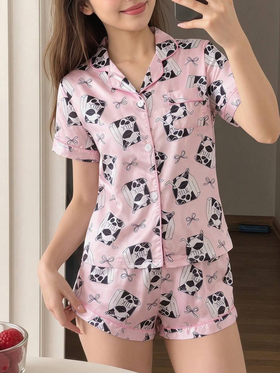Conjunto de pijama de 2 piezas para niñas grandes, con cuello en pico, botones abajo, mangas cortas, pantalones cortos, de verano, en color rosa con ribete de satén en contraste y estampado lindo de taza de leche. Ropa de dormir, ropa de estar por casa, de tela de seda sintética suave, transpirable y ligera, de moda, elegante y con estilo para niños. - Rosa - Ver 1