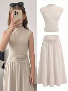 SHEIN Conjunto elegante de punto color albaricoque para niña preadolescente con top sin mangas de cuello mao ajustado con fruncido en la cintura y falda midi - Amarillo - Ver 10