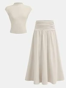 SHEIN Conjunto elegante de punto color albaricoque para niña preadolescente con top sin mangas de cuello mao ajustado con fruncido en la cintura y falda midi - Amarillo - Ver 2