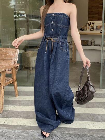 DAZY Bộ jumpsuit denim nữ màu trơn, không dây vai, kiểu dáng casual, có túi hai bên.