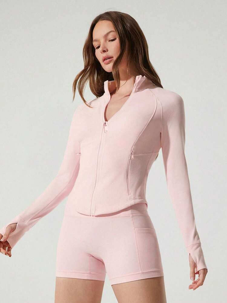 Veste active à manches longues FeatherFit™ de coupe slim avec fermeture éclair et poches, poignets pouces, adaptée pour le yoga, le Pilates, le studio et l'usage quotidien