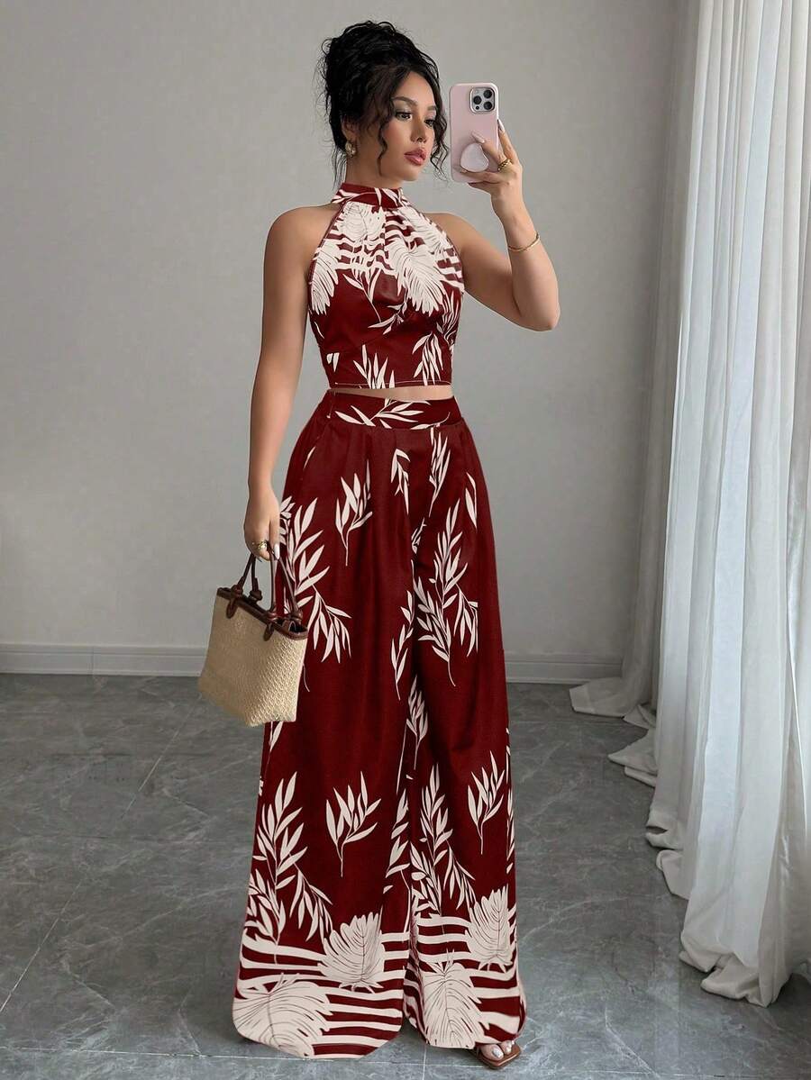 Rafferiza Bộ đồ nghỉ mát thanh lịch dành cho nữ, gồm 2 mảnh: cổ yếm, lưng hở, thắt nơ và quần ống rộng in họa tiết. - Màu Đỏ Sâu - Xem 1