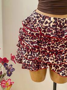 Soleia Set da 2 pezzi con top a colletto asimmetrico in colore unito e pantaloncini con stampa leopardata, taglie comode - Multicolore - Visualizzare 5