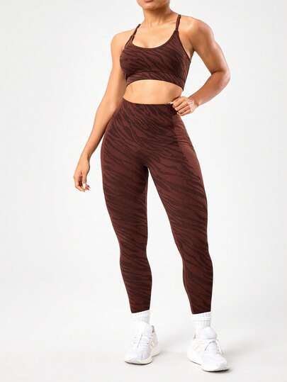 SHEIN Rhythm Era Bộ đồ thể thao cỡ lớn gồm áo ngực và quần legging, họa tiết da báo nâu, kiểu áo ngực thể thao lưng chữ Y và quần thể thao hỗ trợ cao (2 món).