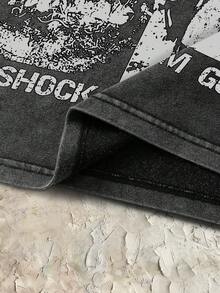 Manfinity Hypemode Camiseta sin mangas de hombre con estampado gráfico vintage y efecto lavado, vacaciones - Negro - Ver 5