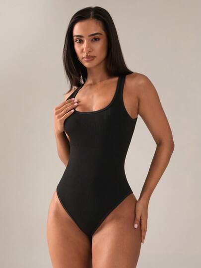 SHEIN BAE Bộ jumpsuit đen gợi cảm dành cho nữ, có khe hở ở đáy quần.