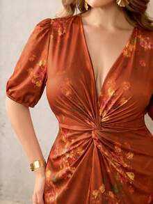 Đầm cỡ lớn cổ chữ V, thắt eo, chất liệu dệt kim xoắn, tay phồng, vạt bất đối xứng, in họa tiết. - màu nâu - Xem 4