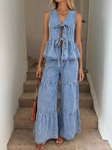 Bộ đồ thời trang nữ đa năng gồm áo vest buộc dây viền bèo nhún và quần jeans ống rộng dáng suông. - Màu xanh lam - Xem 5