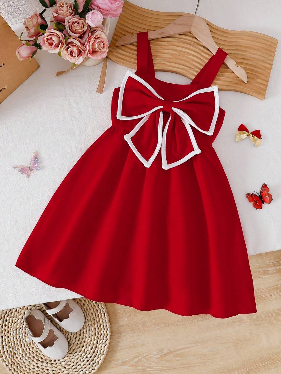 SHEIN Genkimix Kids 少女时尚套装，蝴蝶结装饰吊带裙，甜美可爱，适合度假、轻度派对、街拍