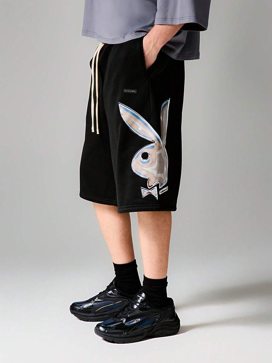PLAYBOY X SUMWON Pantalón de chándal negro de corte relajado con cordón en la cintura e impresión gráfica de conejo - Negro - Ver 1