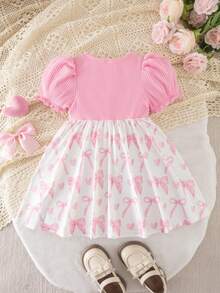 Đầm ngắn tay màu hồng phối nơ dễ thương, thoải mái, kiểu dáng thường ngày cho bé gái. - Hồng - Xem 8