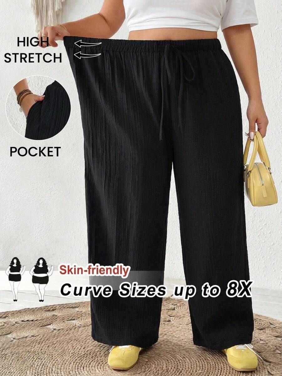 SHEIN CURVE+ Pantalones anchos de pierna ancha de tela texturizada de unicolor 100% algodón con cordón en la cintura, casuales y versátiles para uso diario y viajes, talla grande para mujeres - Negro - Ver 1
